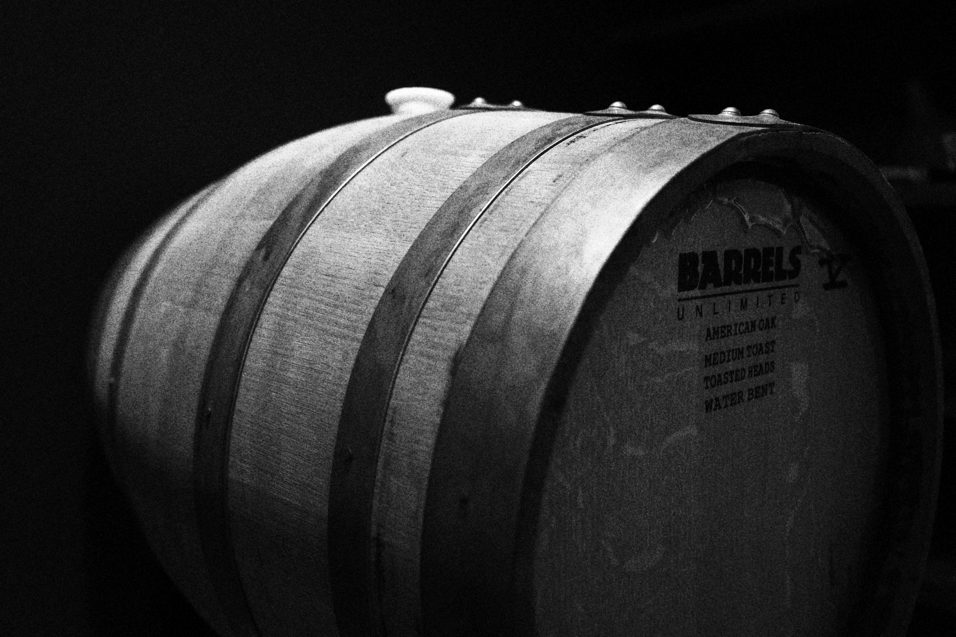 Angled close-up of barrel specification markings